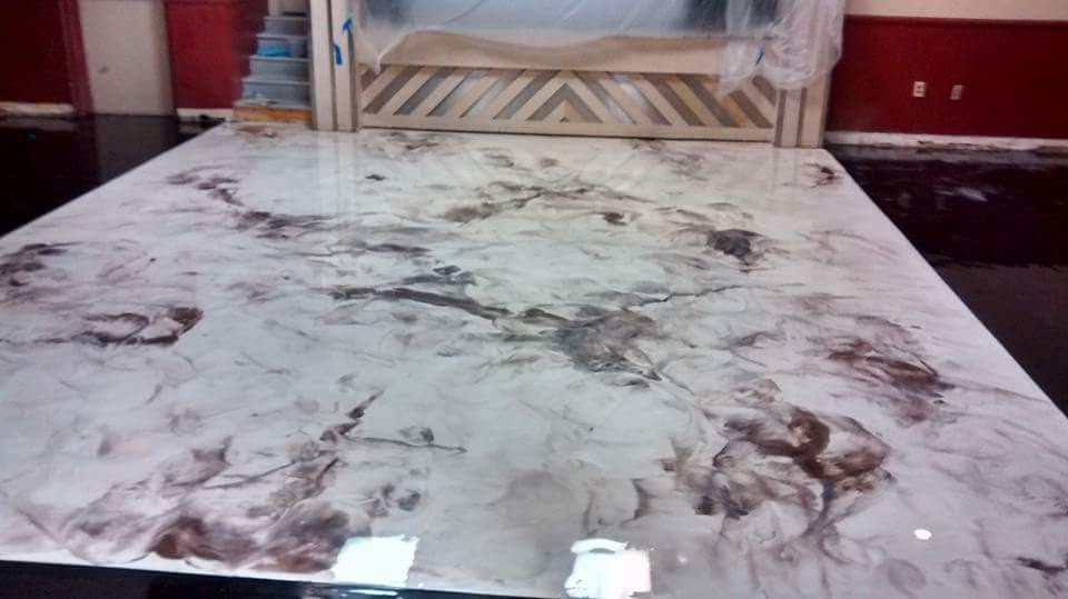 White marble metallic epoxy in commercial showroom