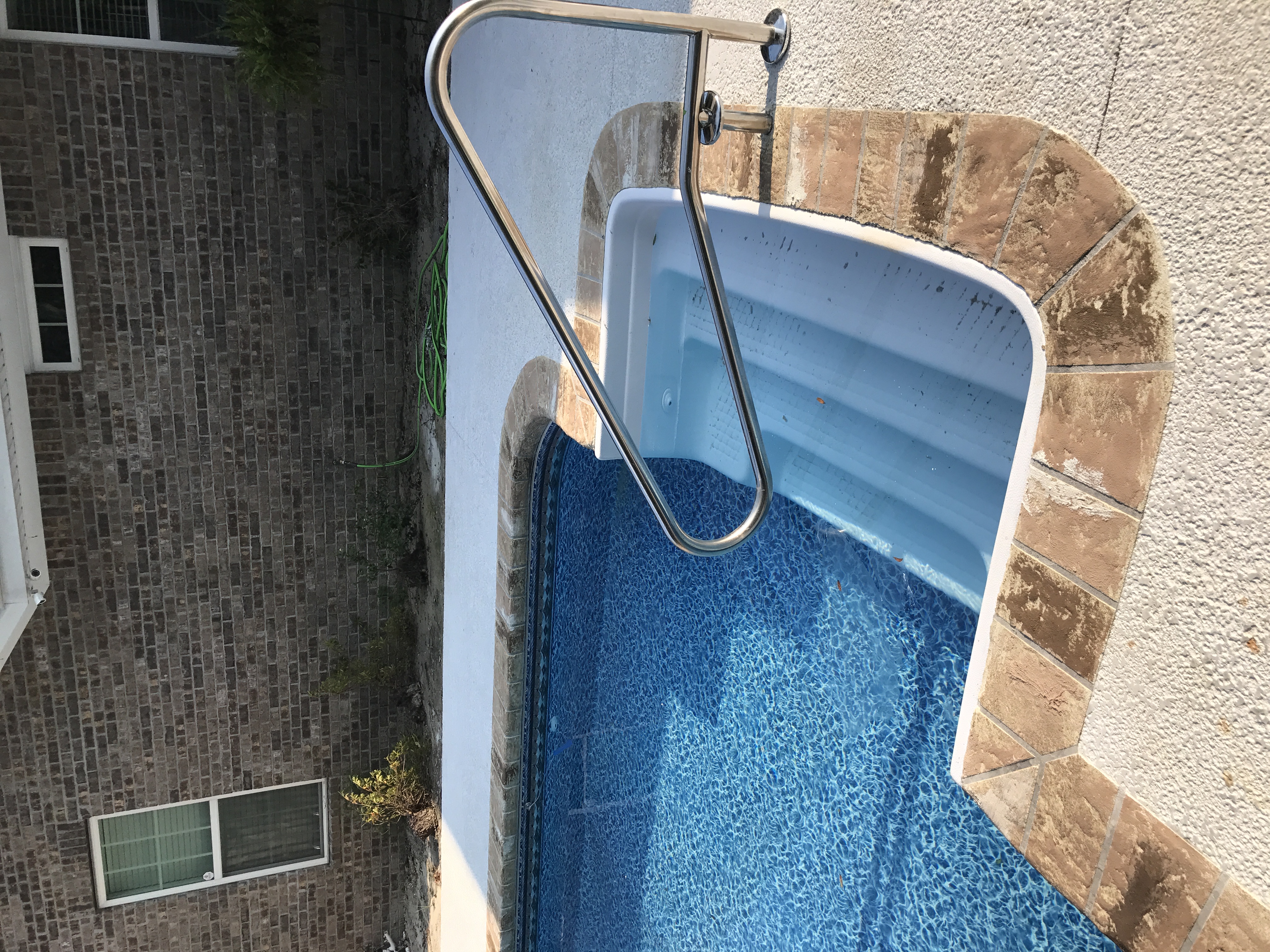 Pool deck with decorative stone concrete coating Savannah GA